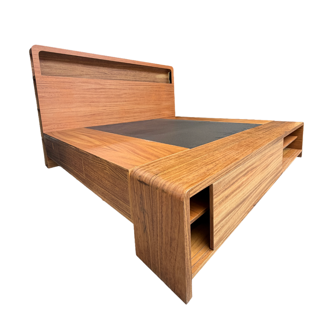 Base de cama con cajones y burós integrados, cuenta con estación de carga en cabecera.