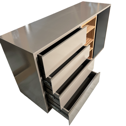 Cajonera con vista lateral viendo parte de los cajones abiertos.