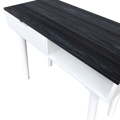 Escritorio Pisa, detalles de madera en color negro de la parte superior del mueble.